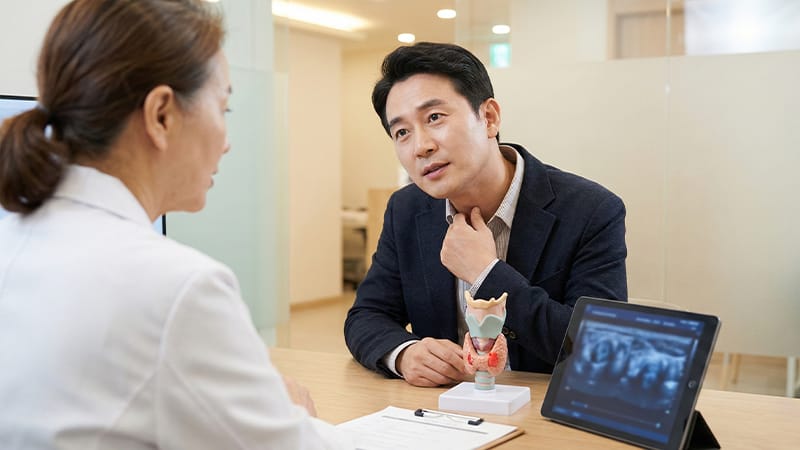 A thyroid patient during a consultation at a hospital